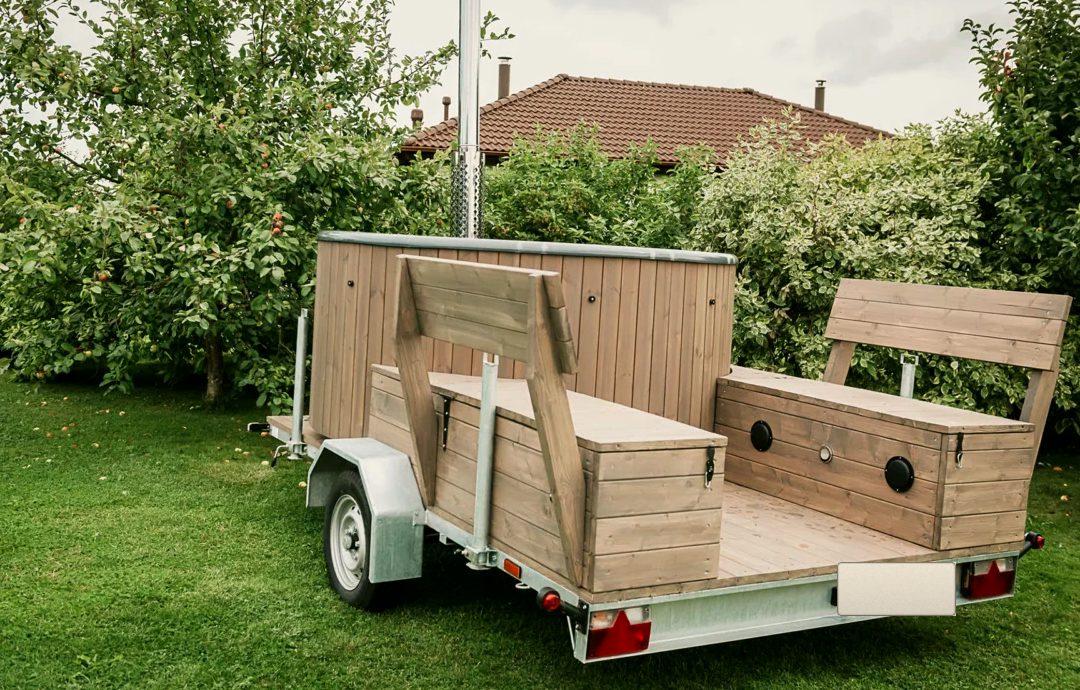 Mobile jacuzzi trailer in a garden